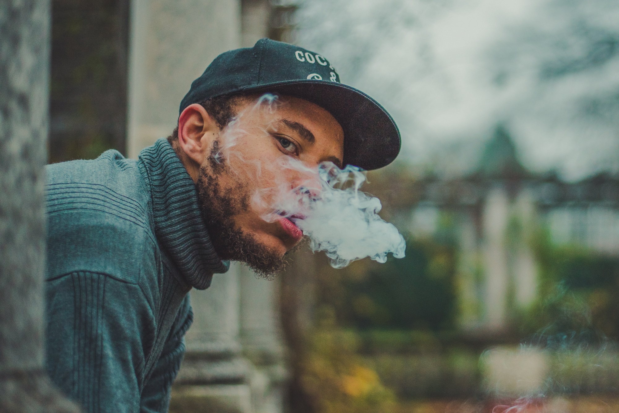 Man blowing smoke